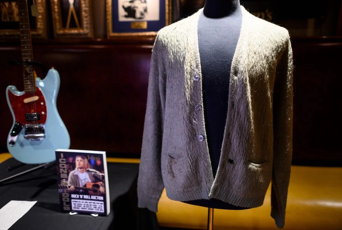 Kurt Cobain’s cigarette-burned sweater sells for $334,000
