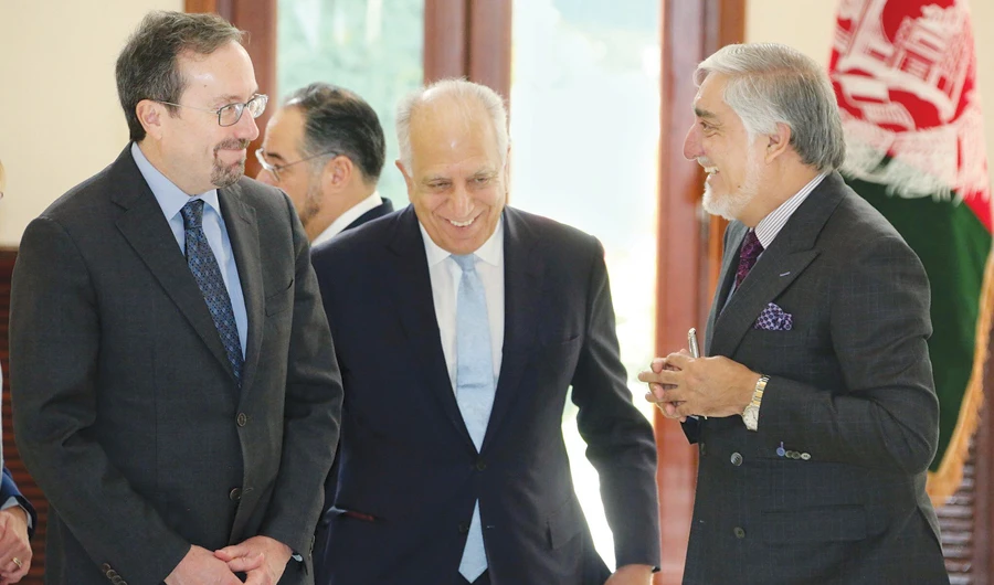 Afghanistan Chief Executive Abdullah Abdullah with Zalmay Khalilzad, US special representative for Afghanistan, and John Bass, US ambassador, in Kabul. (Reuters)