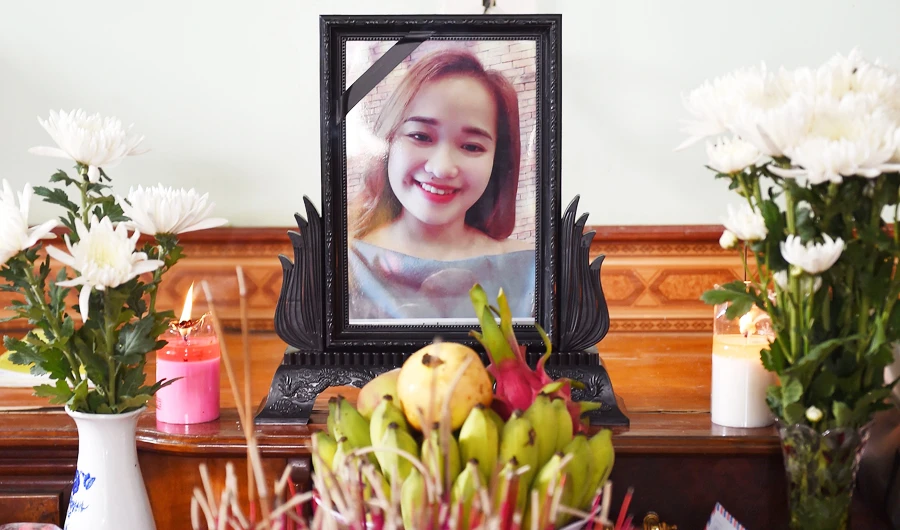 A portrait of Bui Thi Nhung, who is feared to be among the 39 people found dead in a truck in Britain, is kept on a prayer altar at her house in Vietnam's Nghe An province on October 27, 2019. (AFP)