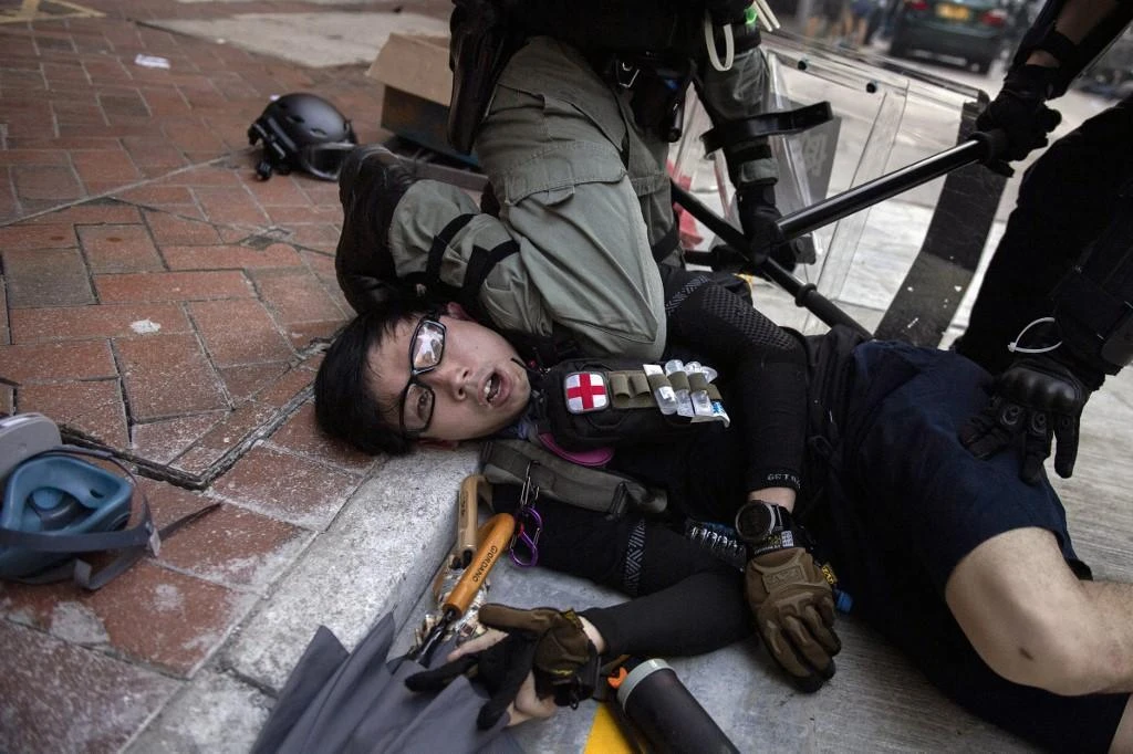 It would be ‘extremely difficult’ to achieve the government’s pre-protest forecast of zero to one percent annual economic growth, a Hong Kong official said. (AFP)