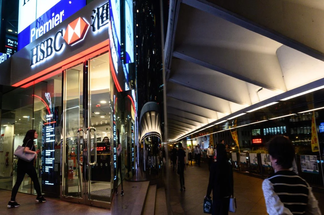 The Sino-US trade war and Brexit uncertainties weighed on business sentiment in HSBC’S core markets of Asia and Britain. (AFP)