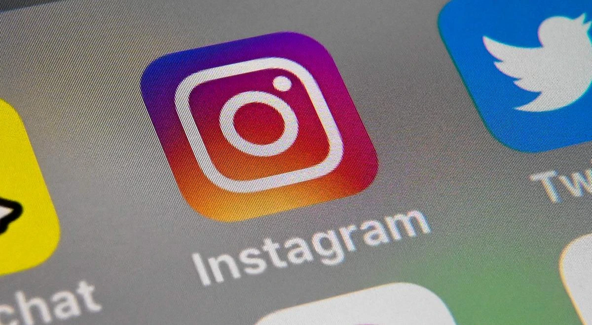 In this file photo taken on October 1, 2019 in Lille shows the logo of mobile app Instagram displayed on a tablet. Fresh rules in place at Instagram on October 28, 2019 ramped up a ban on images that might encourage suicide or self harm, adding drawings and other fictional content to the list. (AFP)