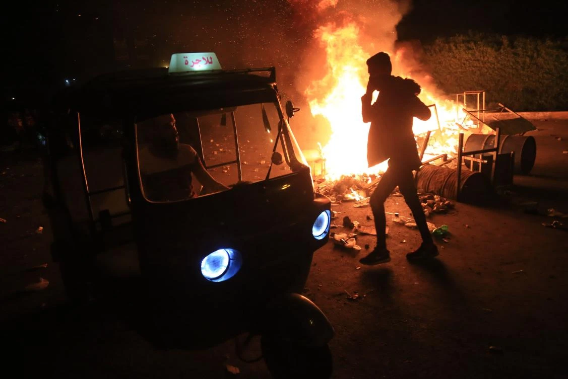 Masked men attack protesters in Iraq’s Karbala, killing 18