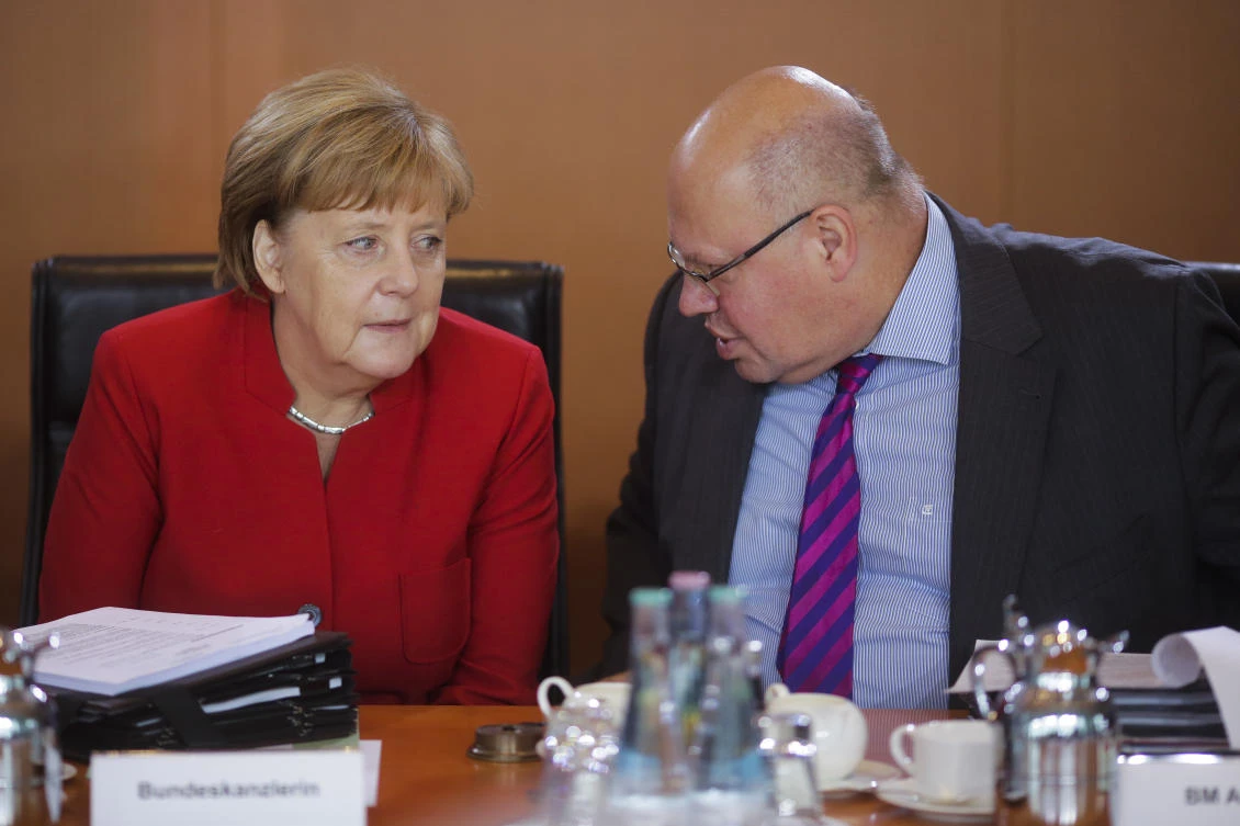 Germany's economy minister Peter Altmaier has fallen as he left a stage during an event named Digital Summit inn Dortmund, Germany, at which he was presenting a European digital cloud project. (AP)