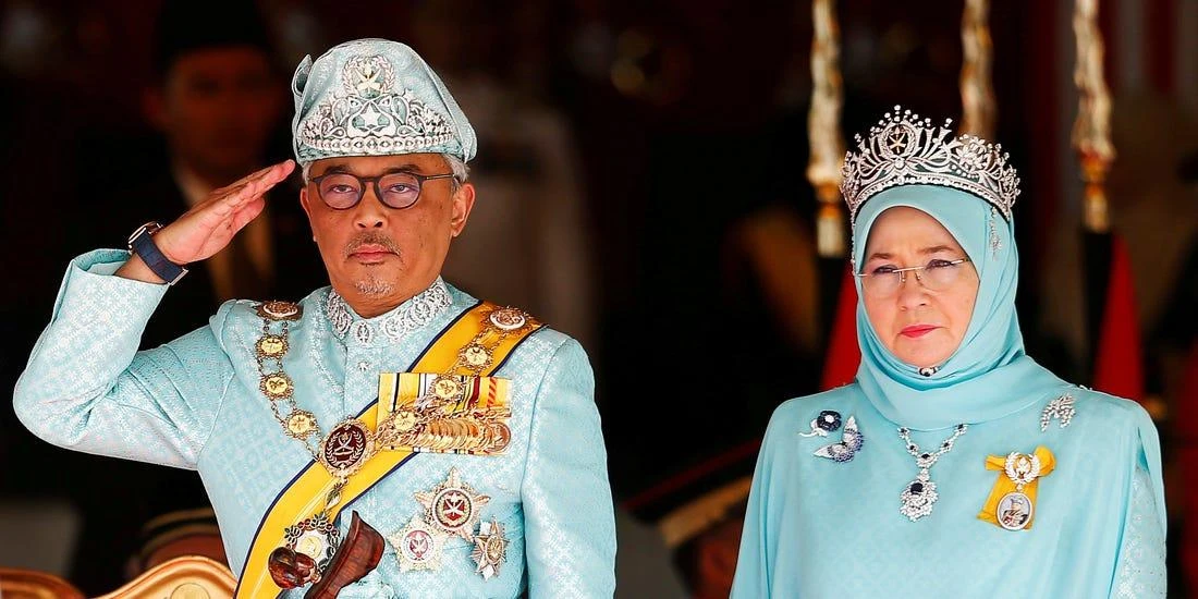 Malaysia’s new King Sultan Abdullah Sultan Ahmad Shah and Queen Tunku Azizah Aminah Maimunah Iskandariah attend a welcoming ceremony at the Parliament House in Kuala Lumpur. (Reuters)