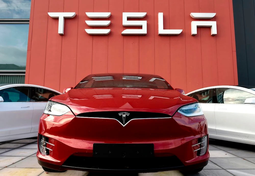 The logo marks the showroom and service center for the US automotive and energy company Tesla in Amsterdam on October 23, 2019. (AFP/ File Photo)