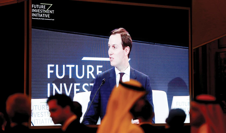 White House senior adviser Jared Kushner is seen on a screen as he attends the Future Investment Initiative conference in Riyadh on Tuesday. (Reuters)