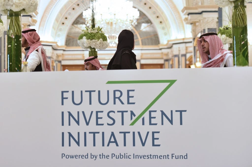 Local staff and delegates are pictured at the King Abdulaziz Conference Centre in Saudi Arabia's capital Riyadh to attend the Future Investment Initiative (FII) forum on October 29, 2019. (AFP)