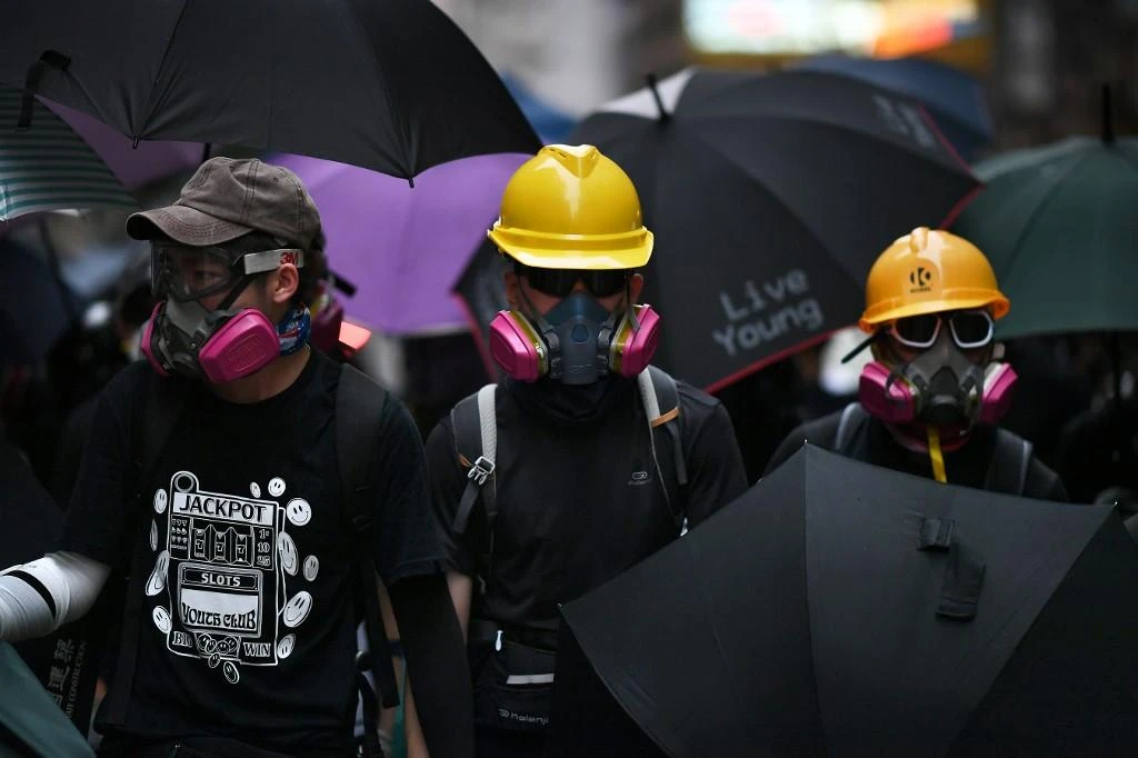 The protesters say they will march from a park in the Causeway Bay shopping district through the heaving bar streets of Wan Chai to the steep narrow foothills of the Peak above Central. (File/AFP)