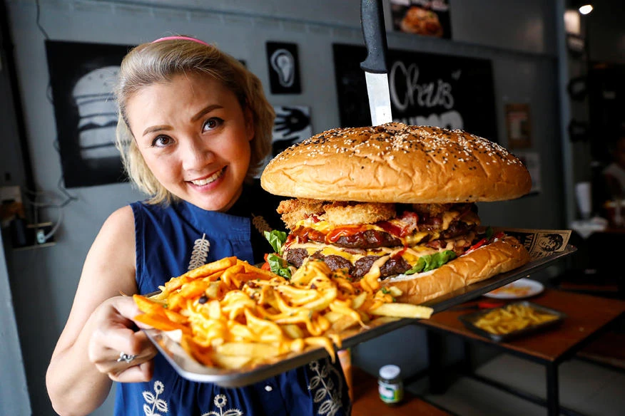The race to eat Bangkok’s ‘biggest burger,’ a 10,000-calorie challenge
