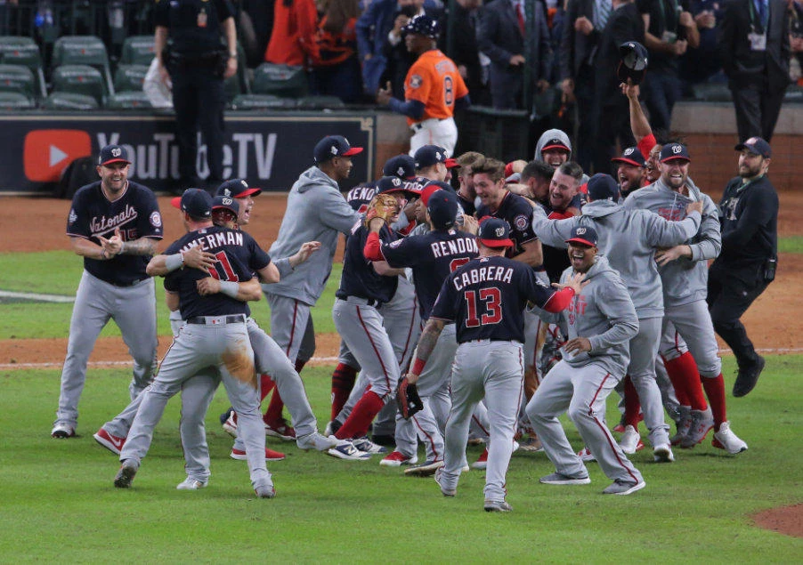Washington Nationals players celebrate on the field after defeating the Houston Astros in game seven of the 2019 World Series at Minute Maid Park. (Erik Williams-USA TODAY Sports)