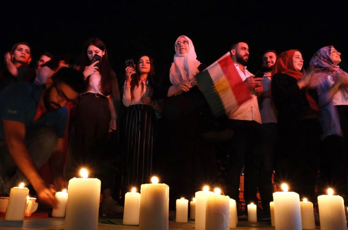 Iraqi Kurds hold A candlelight vigil to express their opposition to the Turkish offensive in northeastern Syria, in Arbil, the capital of the northern Iraqi Kurdish autonomous region, on October 28, 2019. (AFP)