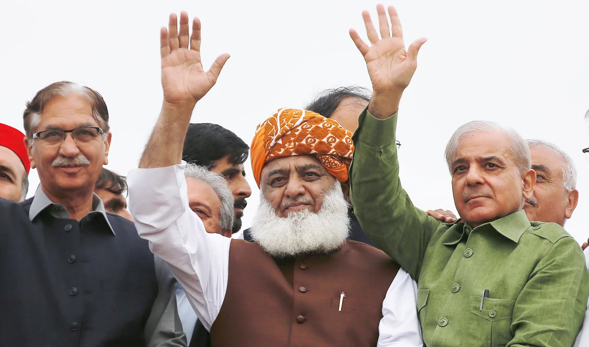 Rehman is leading tens of thousands of opposition supporters to demand the resignation of the government. (AP)