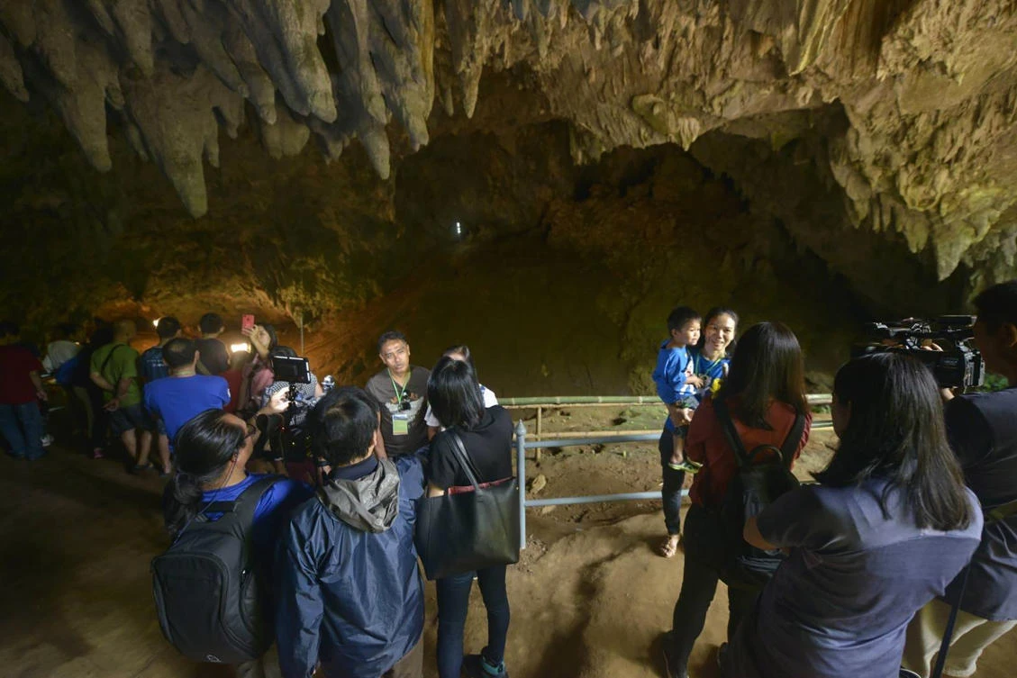 The Tham Luang cave’s reopening drew some 2,000 tourists in a single day, but were not allowed beyond the entrance for now. (Chiang Rai Provincial Public Relations Office/AFP)