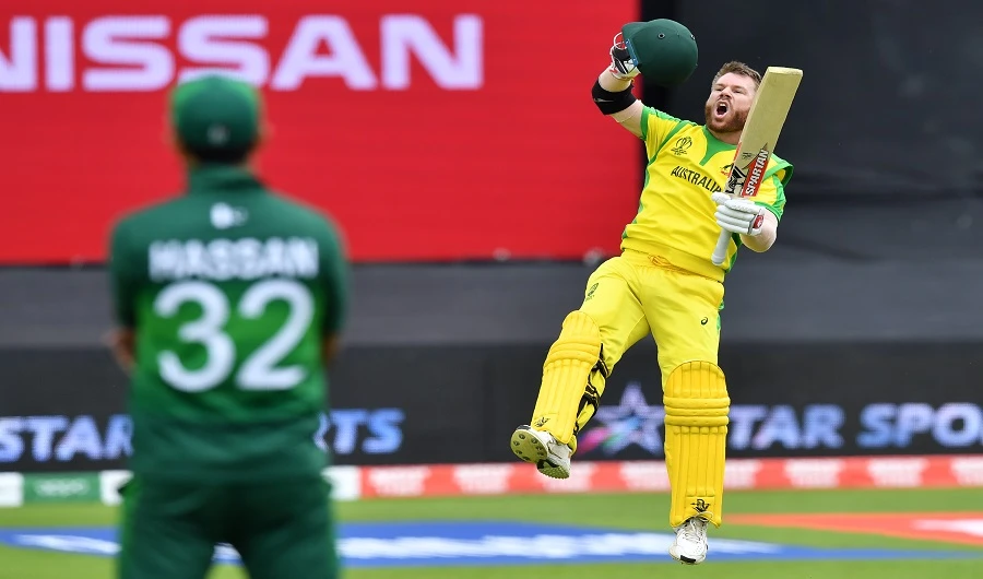 Australia's David Warner celebrates after scoring a century (100 runs) during the 2019 Cricket World Cup group stage match between Australia and Pakistan at The County Ground in Taunton, southwest England, on June 12, 2019. (AFP)