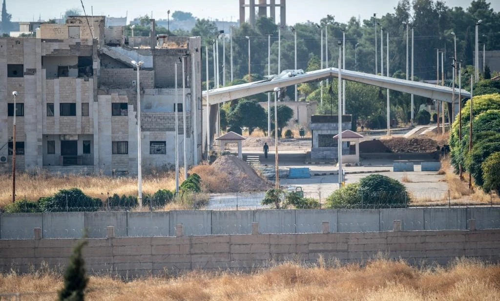 Explosion in Syrian town on Turkish border kills 13