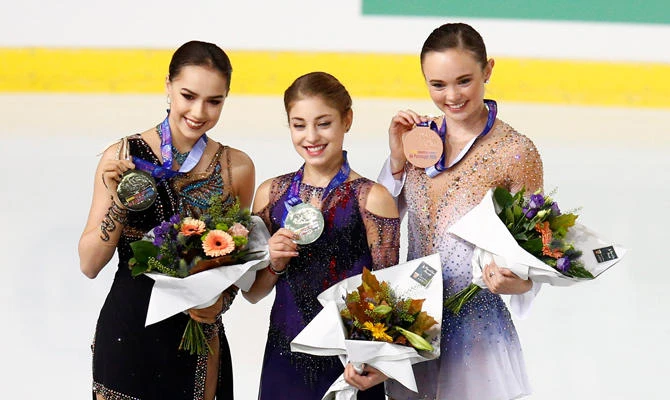 Russia's Alena Kostornaia, Russia's Alina Zagitova and Mariah Bell of the US pose with their gold, silver and bronze medals, respectively. (REUTERS/Emmanuel Foudrot)