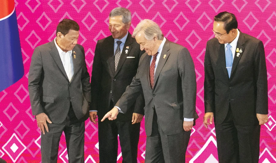 UN Secretary-General Antonio Guterres, second right, gestures with leaders of ASEAN, from left, Philippines President Rodrigo Duterte, Singapore’s Foreign Minister Vivian Balakrishnan, and Thailand’s Prime Minister Prayuth Chan-ocha, during ASEAN-UN summit in Nonthaburi, Thailand on Sunday. (AP)