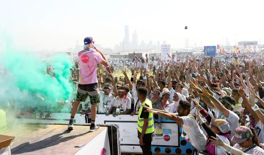 People attend the Colour Run event during Riyadh season festival, in Saudi Arabia, October 26, 2019. (REUTERS)