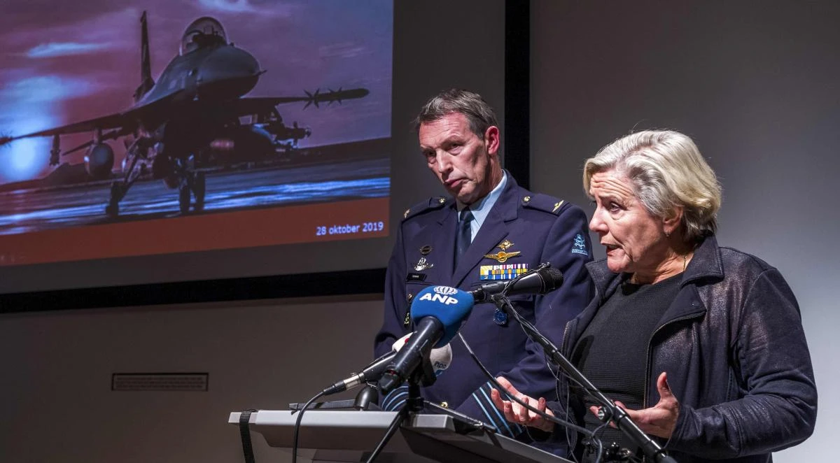 Dutch Defense Minister Ank Bijleveld (R) and Colonel aviator Peter Tankink attend a press conference in the Hague, the Netherlands, on November 4, 2019, about an attack by a Dutch F-16 on an IS car bomb factory in Hawija, Iraq, in 2015. (AFP)