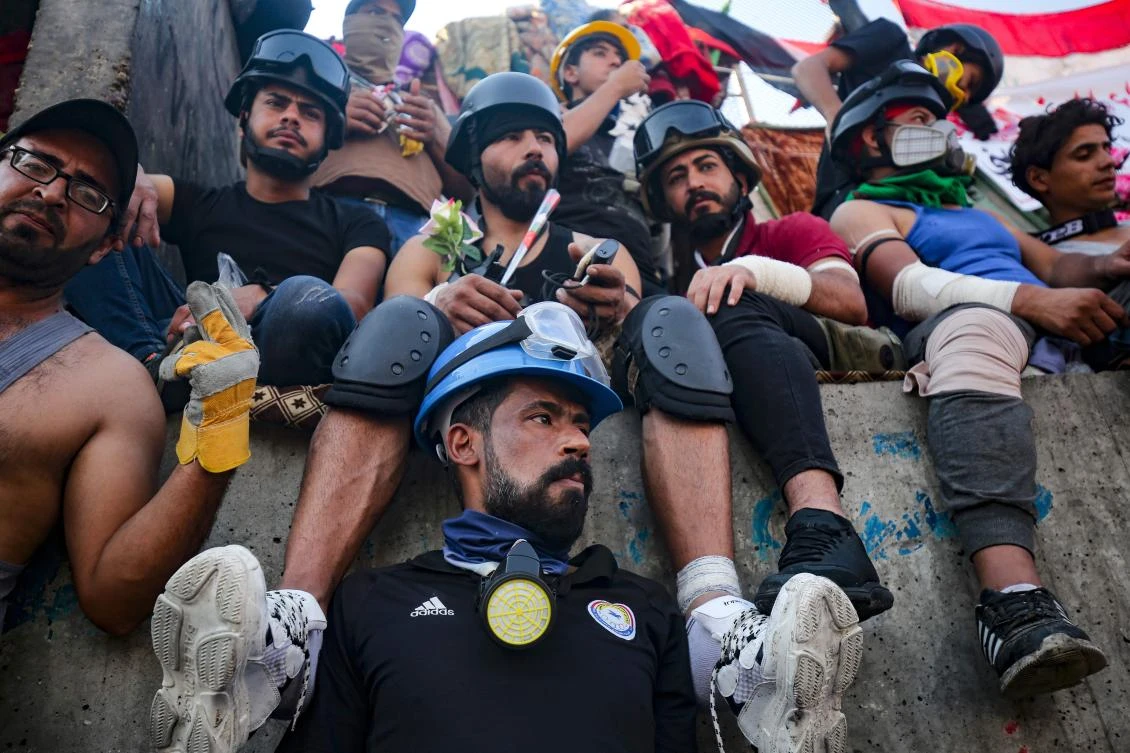 Iraqi demonstrators gather near Al-Jumhuriya bridge which leads to the high-security Green Zone. (AFP)