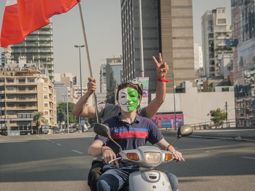 Protesters struck some individual poses in largely peaceful demonstrations on the streets of Beirut. (AN Photo)