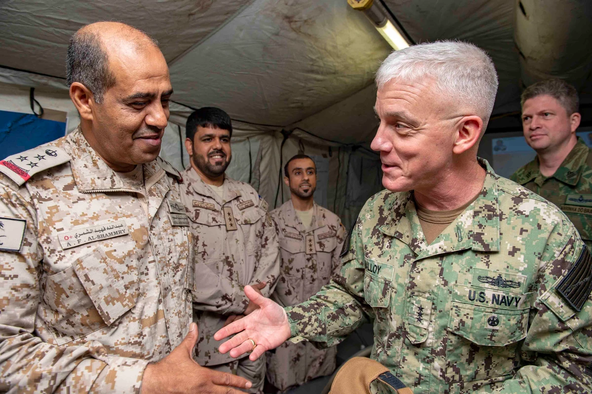 Vice Adm. James Malloy, commander of the US Navy's Bahrain-based Fifth Fleet, greets Rear Adm. Abdullah Al-Shammary of the Royal Saudi Naval Forces. (US Central Command)