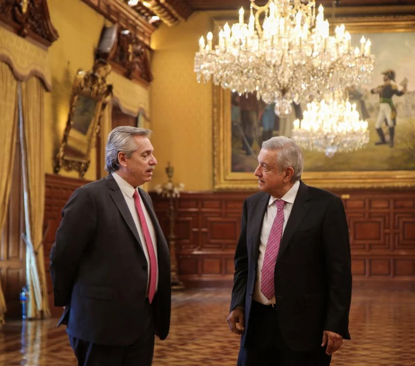 Argentine President-elect Alberto Fernandez (L) and Mexican President Andres Manuel Lopez Obrador talking during a meeting at the National Palace in Mexico City, on November 4, 2019. (File/AFP)
