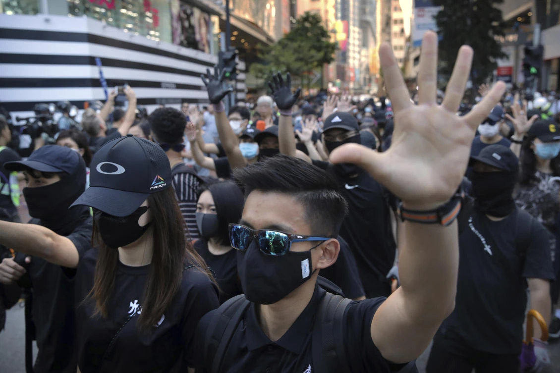 Demonstrators wearing masks gather during an anti-government protest in Hong Kong, Saturday, Nov. 2, 2019. (AP)