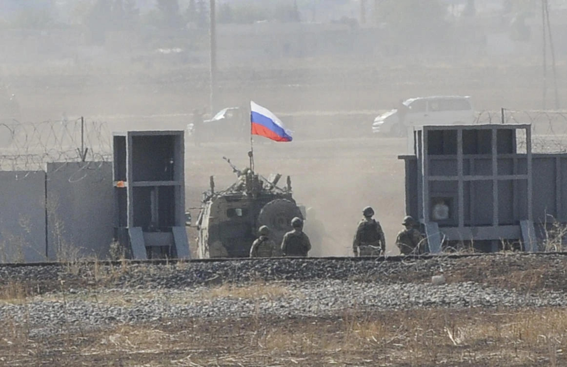 A Russian army vehicle enters Syria as it begins its joint patrol with Turkish forces on Tuesday, Nov. 5, 2019. (AP)