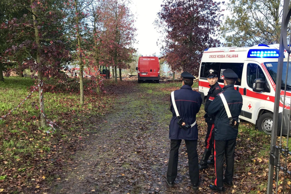 Carabinieri officers stand at the entrance of a farm following an explosion in a building in Quargnento, Northern Italy, Tuesday, Nov. 5, 2019. (AP)