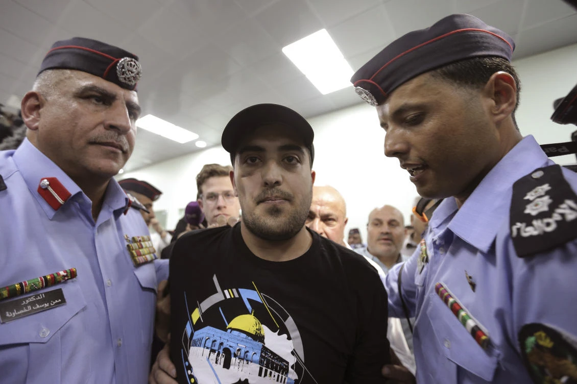 Released Jordanian detainee Abdul Rahman Miri arrives at the King Hussein Bridge border crossing, Jordan, on Wednesday, Nov. 6, 2019. (AP)
