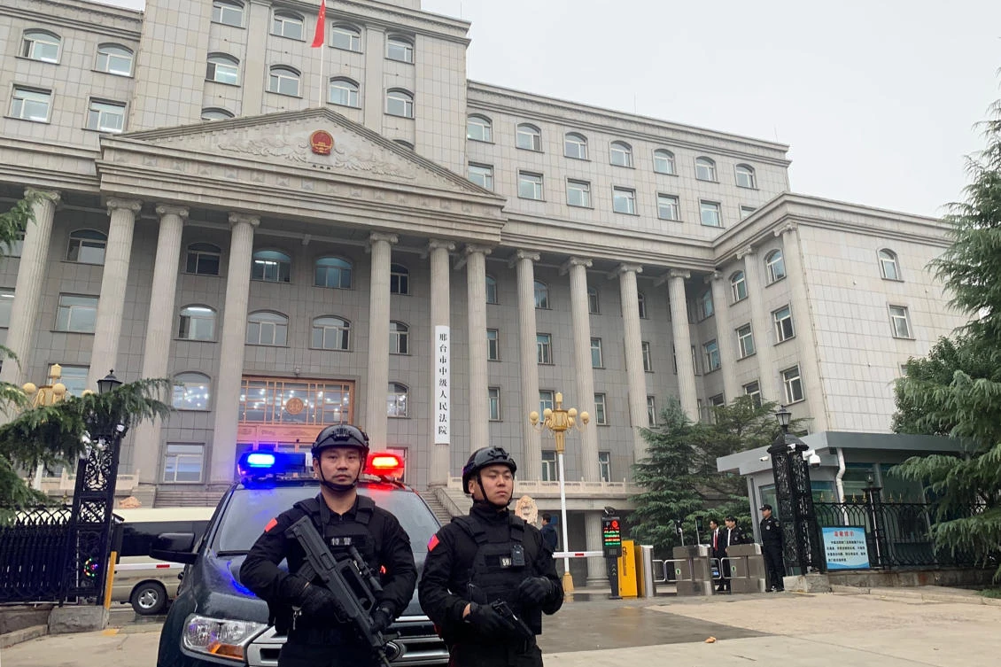 Police stand guard outside the Xingtai Intermediate People’s court in Xingtai, China Thursday, Nov. 7, 2019. (AP)