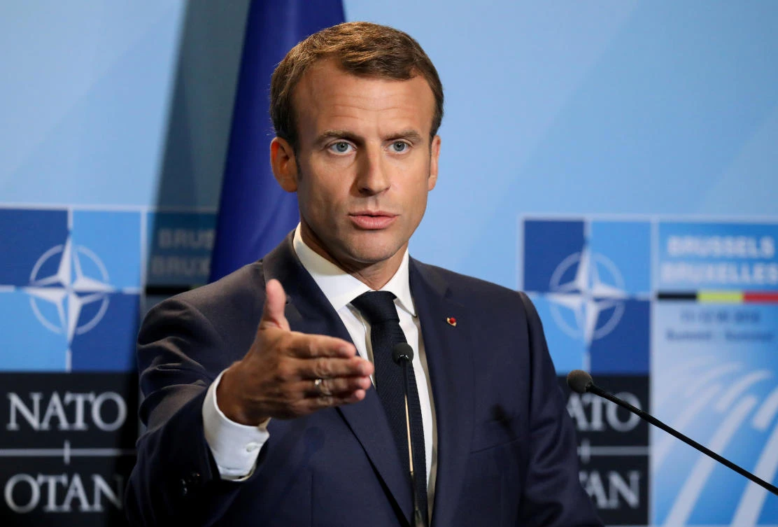 French President Emmanuel Macron addresses a press conference on the second day of the North Atlantic Treaty Organization (NATO) summit in Brussels, Belgium. (Reuters)