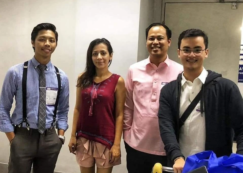Bahareh Zare Bahari with her lawyer, Agustin Bacunganat ( in pink shirt) and his team at Manila's Ninoy Aquino International Airport (NAIA) Manila after Bahar was granted asylum to the Philippines, Manila Nov, 07, 2019 ( Photo courtesy Martelino Bacungan and Associates)