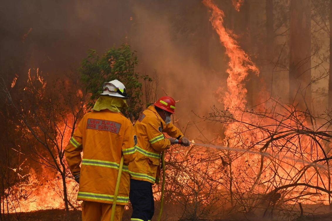 Around 1,500 firefighters were battling more than 70 fires across Australia’s most populous state, New South Wales. (AFP)