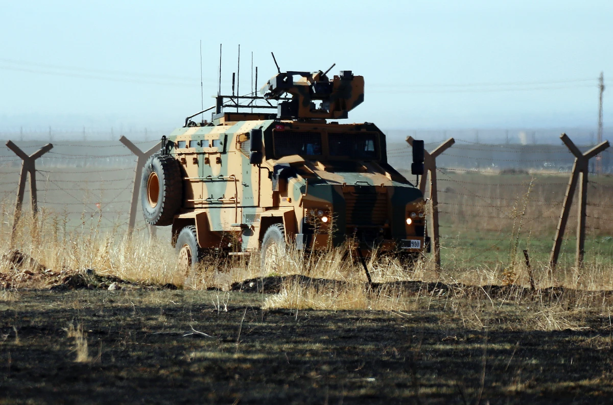 A Turkish army vehicles is driven in Turkey after conducting a joint patrol with Russian forces in Syria, Friday, Nov. 8, 2019. (AP)