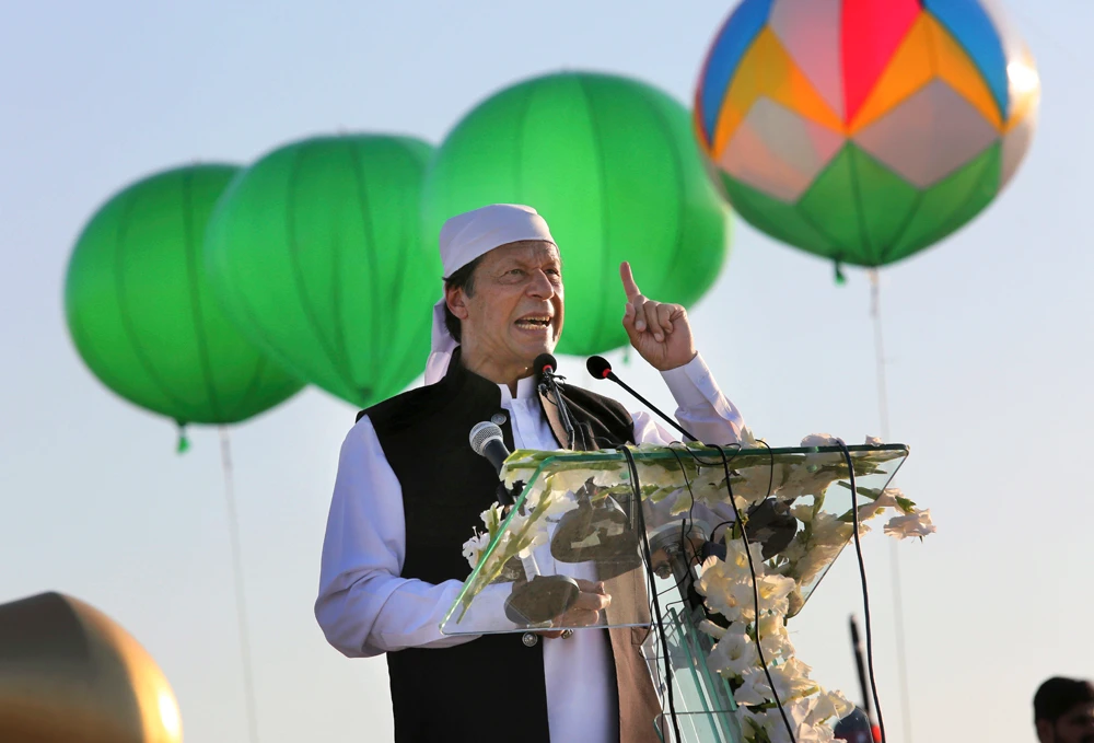 Pakistan Prime Minister Imran Khan delivers his address during the inauguration ceremony of Gurdwara Darbar Sahib in Kartarpur, Pakistan, on Nov. 9, 2019. (AP Photo/K.M. Chaudary)