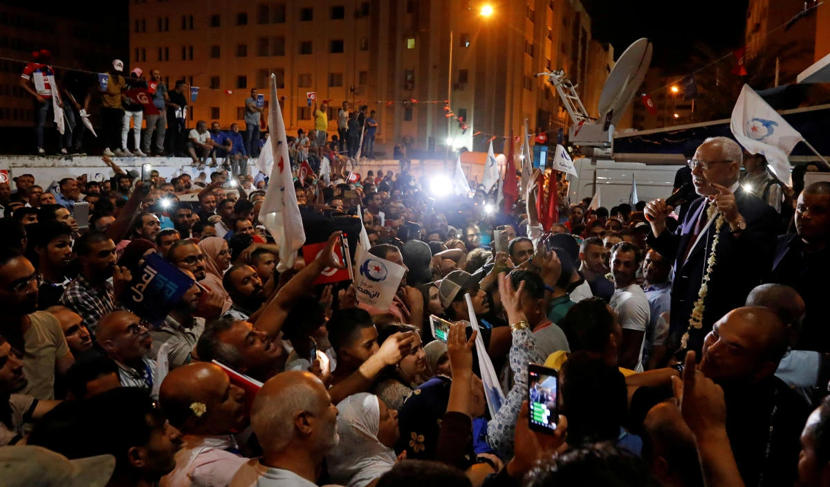 Rached Ghannouchi, leader of Tunisia's moderate Islamist Ennahda, speaks to supporters after the party gained most votes in Sunday's parliamentary election, according to an exit poll by Sigma Conseil broadcasted by state television, in Tunis, Tunisia October 6, 2019. (Reuters)