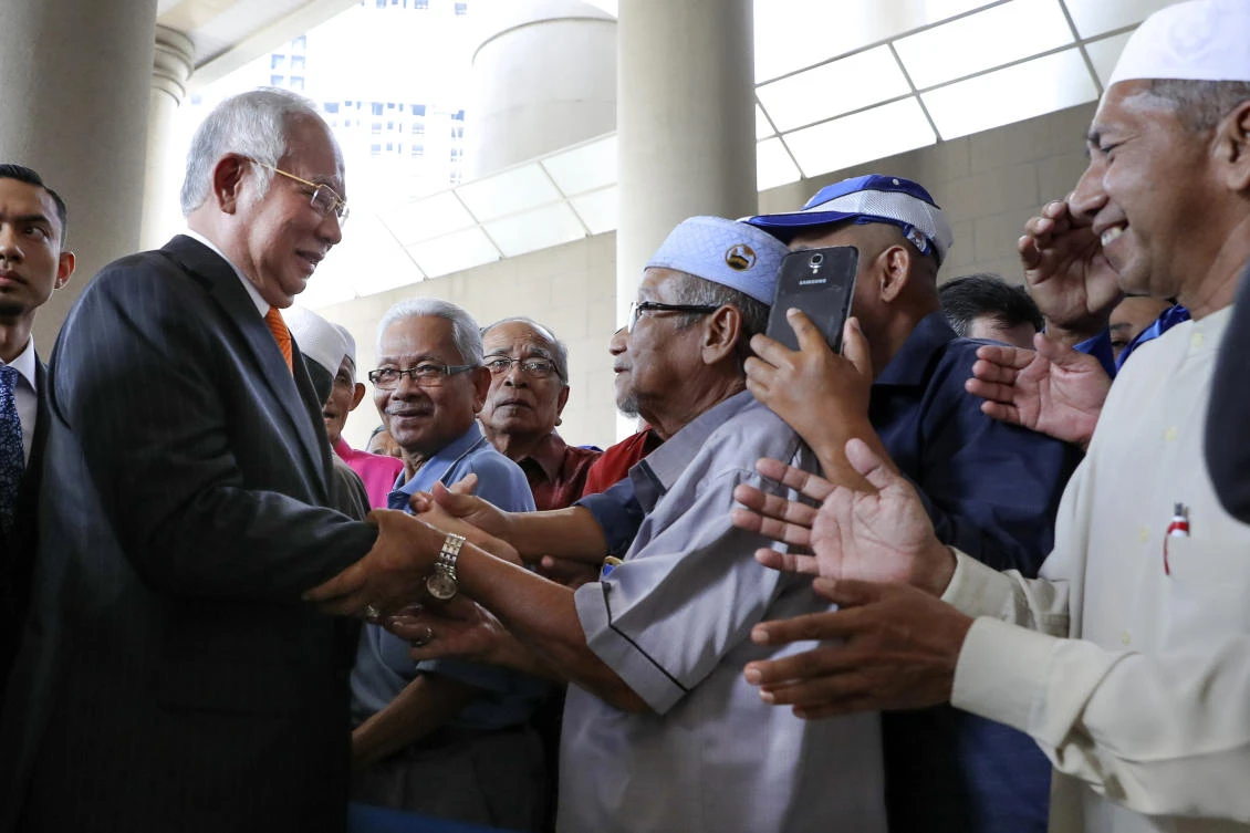 The trial involves seven graft charges related to 42 million ringgit ($10.1 million) that allegedly went into from Malaysian leader Najib Razak’s bank accounts from a former unit of the 1MDB fund. (AP)