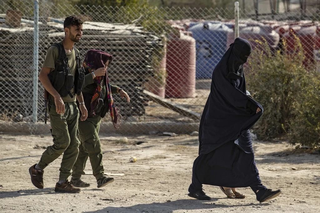 The women and children were living in “deplorable conditions” in the Al-Hol camp in Northern Syria. (AFP/File photo)