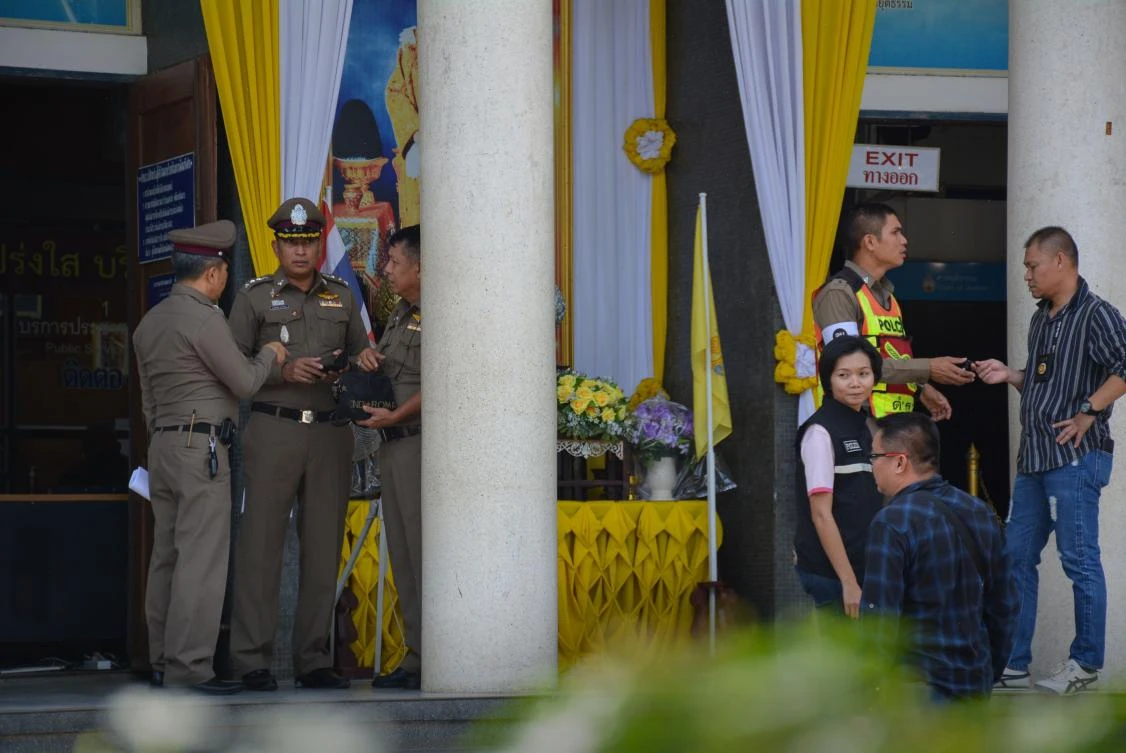 Thai Royal Police officers and investigators are seen outside the Chantaburi provincial court after shooting incident on November 12, 2019. (File/AFP)