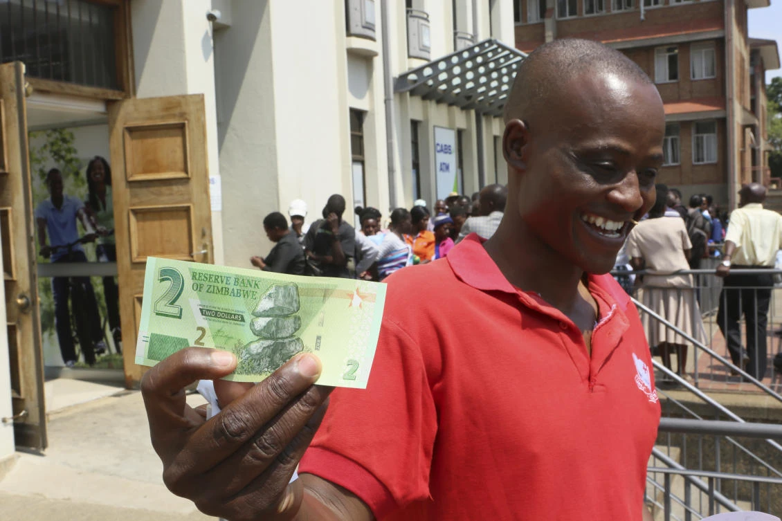With prices in Zimbabwe rising faster than at any point in a decade amid rapid devaluation of the local currency, cash is king. (AP)
