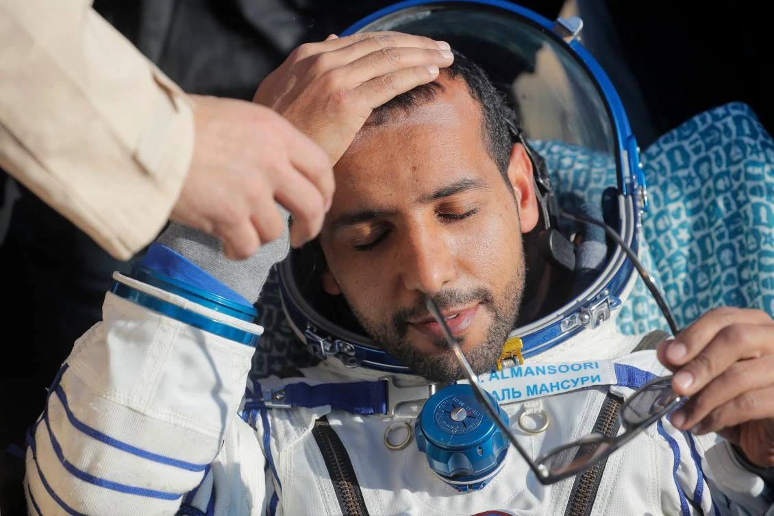 UAE astronaut Hazzaa al-Mansoori reacts shortly after the landing of the Russian Soyuz MS-12 space capsule about 150 km south-east of the Kazakh town of Dzhezkazgan on October 3, 2019. (AFP)