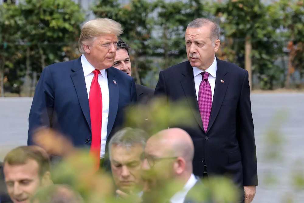 Even as Erdogan meets with Trump on Wednesday, the US Congress is pushing forward with more sanctions against Turkey for its invasion of Syria disguised as a military operation. (AFP)