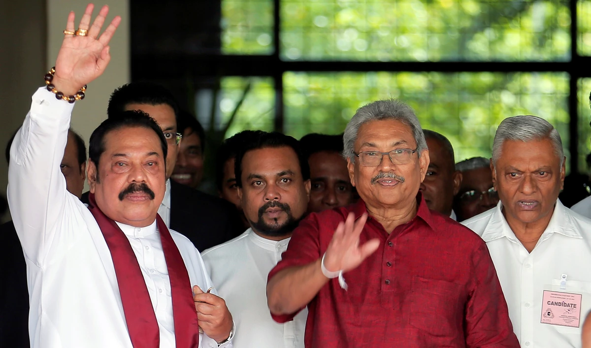 Gotabaya Rajapaksa, Sri Lanka People's Front party presidential election candidate and former wartime defence chief, with his brothers, Mahinda Rajapaksa, former president and opposition leader and Chamal Rajapaksa (R). (Reuters)