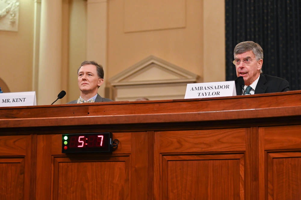 George Kent, the deputy assistant secretary of state for European and Eurasian affairs and William Taylor, the top US diplomat in Ukraine, testify in a House Intelligence Committee impeachment inquiry hearing into President Donald Trump on Capitol Hill in Washington on Nov. 13, 2019. (REUTERS/Erin Scott)