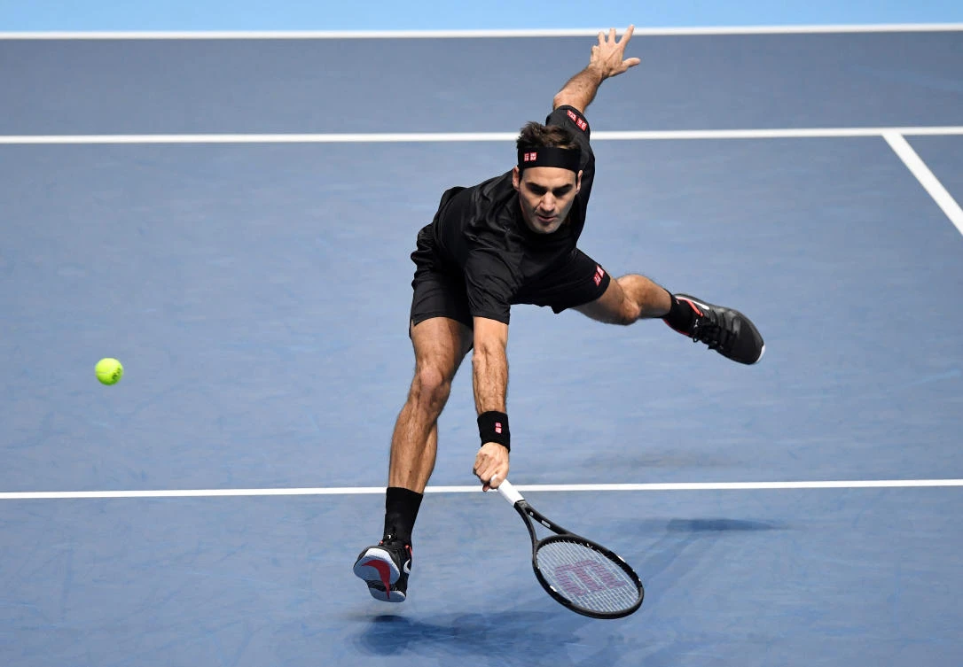 Switzerland’s Roger Federer in action during his group stage match against Serbia’s Novak Djokovic at the ATP Finals in London. (Action Images via Reuters)
