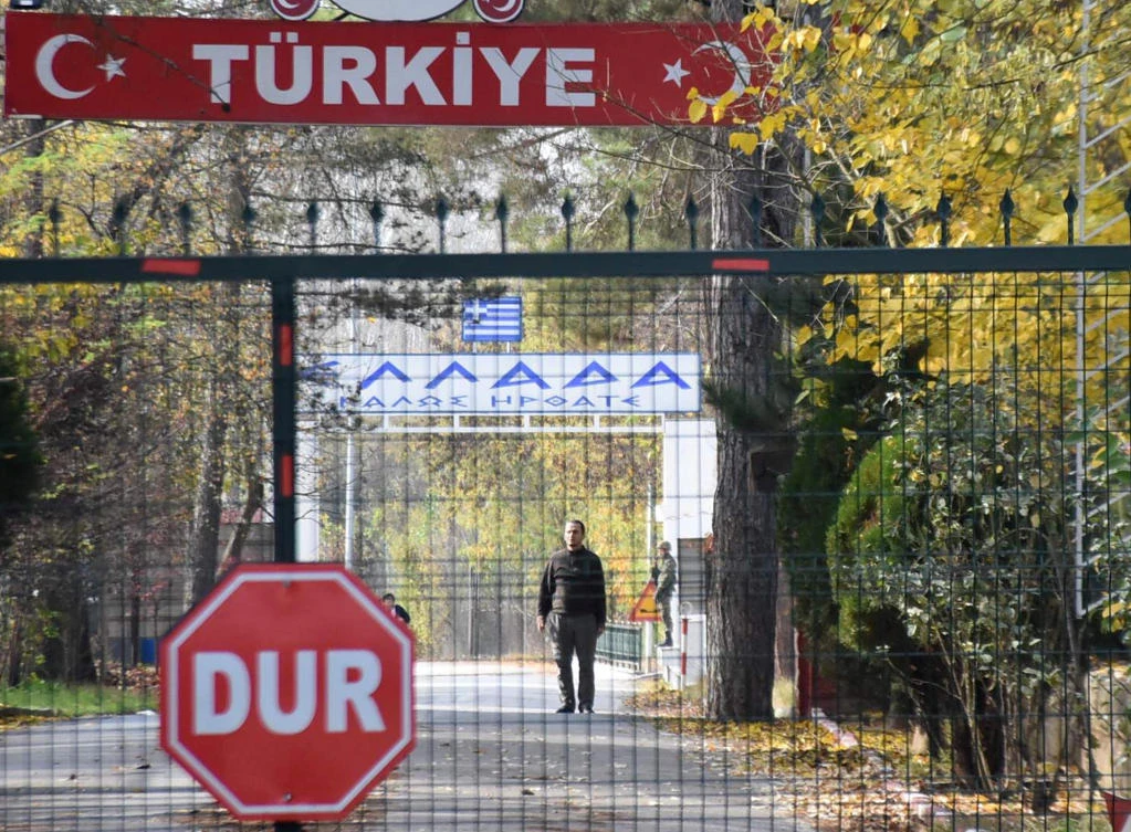 A US citizen of Arab descent and Daesh suspect who was deported by Turkey, stands on no-man’s land between Turkey and Greece, as he is pictured from the Pazarkule border crossing near Edirne, Turkey. (Reuters)