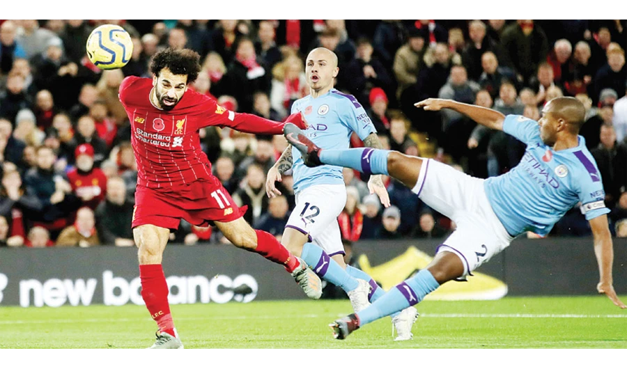 Liverpool‘s Mohamed Salah scores a goal against Manchester City. (Reuters)